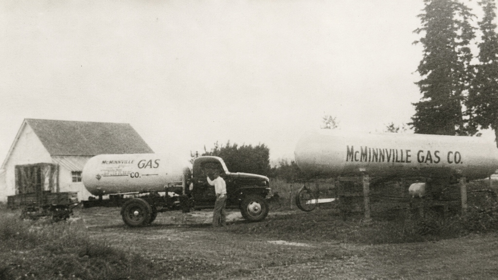 Historical McMinnville Gas truck and storage tank from 1946